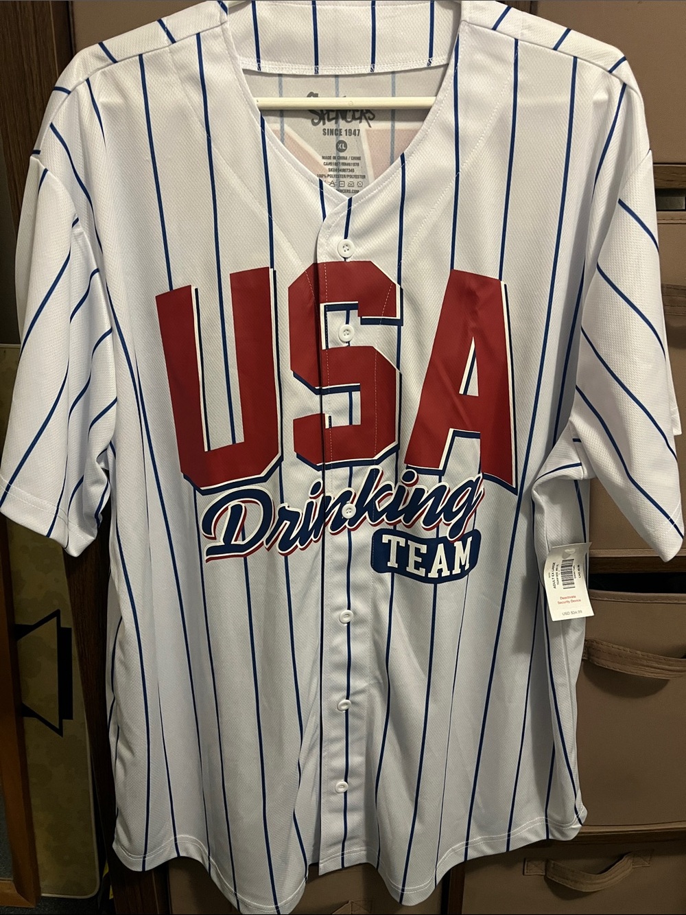 Spencer's White Jersey with Blue Pinstripes and Red Lettering